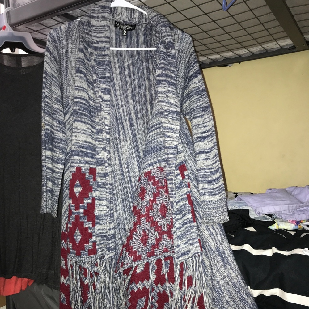 Long cardigan with fringe at the bottom